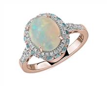 Oval Opal and Swiss Blue Topaz Halo Ring In 14k Rose Gold | Blue Nile