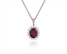 Oval Ruby and Diamond Sunburst Halo Pendant Necklace In 14k Rose Gold (9X7mm) | Blue Nile