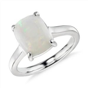 https://www.pricescope.com/jewelry/right-hand-rings/opal-cushion-cocktail-ring-in-14k-white-gold-10x8mm-42520