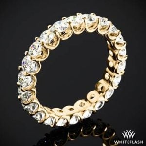 Annette’s U-prong eternity and diamond wedding ring set in 18K yellow gold at Whiteflash 