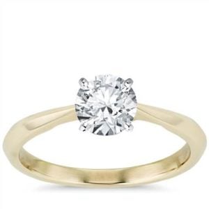Truly Zac Posen knife-edge solitaire engagement ring set in 14K yellow gold at Blue Nile 