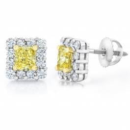 Fancy yellow diamond earrings set in platinum at I.D. Jewelry