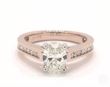 A Delicate Channel-Set Engagement Ring set in 14K Rose Gold.
