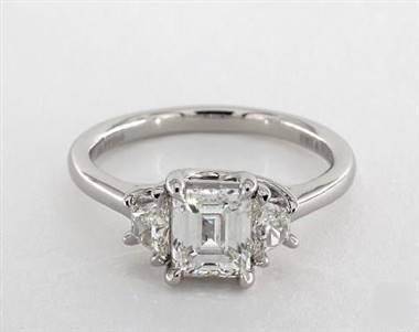 A Trapezoid Diamond Three-Stone Engagement Ring set in Platinum.