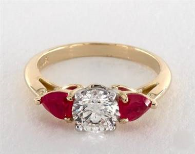 hree-Stone Pear-Ruby Engagement Ring in 18K Yellow Gold Band.