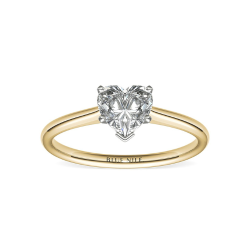 Petite Solitaire Engagement Ring in 18k Yellow Gold.