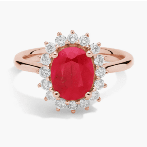 Oval Ruby and Diamond Sunburst Halo Ring in 14K Rose Gold at Blue Nile